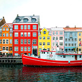 Picture of a boat and colorful houses in Denmark